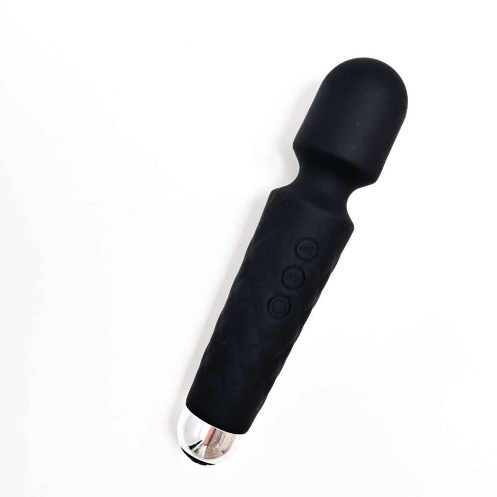 Sort wand vibrator med kraftigt hoved på neutral baggrund, kraftfuld massagevibrator til dyb klitorisstimulering